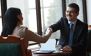 Chamber members meeting around a table