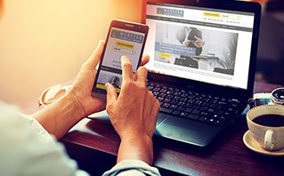 A designer sketching a website layout